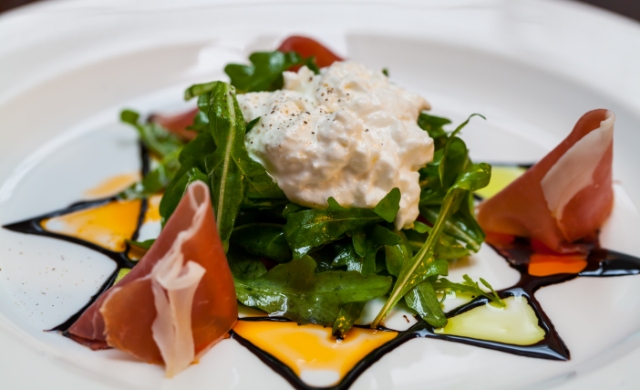Rocket salad with tomato, prosciutto and burrata at Bistecca Tuscan Steakhouse