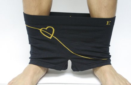 Black trunks with yellow heart print from Elle Homme. B520